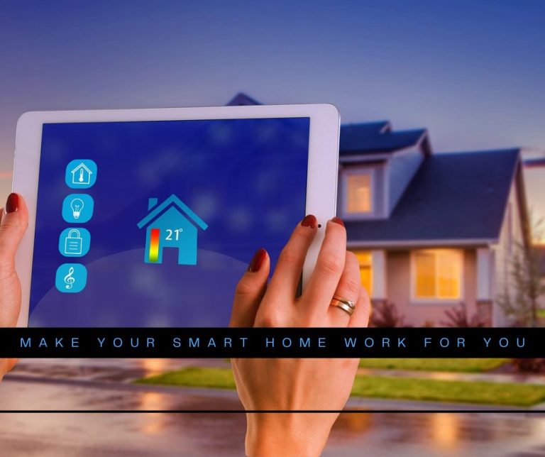 Picture the outside of a home with a set of female hands holding a white tablet. A black banner with blue writing says, "Make your smart home work for you."