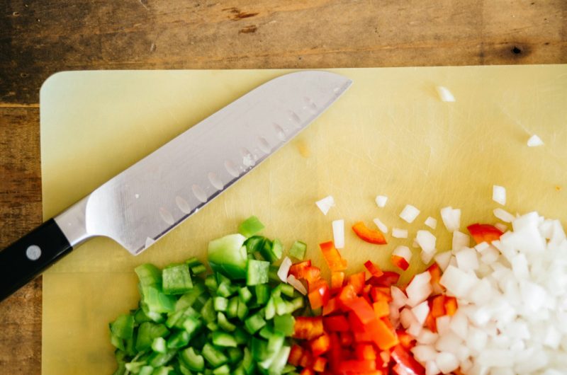 Chopped vegetables prepared ahead of time as part of a busy mom’s weekly meal planning routine.