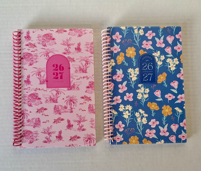 Two day planners, one pink and one blue for 2026--2027 year.